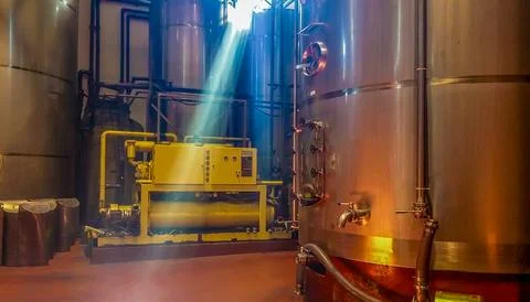 Winemaking machinery processing grape must in la rioja winery Stock Photos