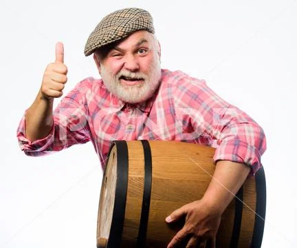 Winery concept. Homemade wine. Producing wine family tradition. Man bearded Stock Photos