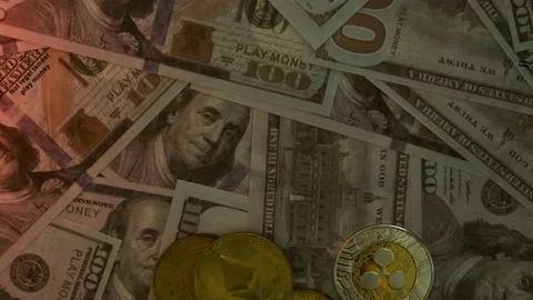 Wines on coins of cryptocoins on US dollars Stock Footage 201222657