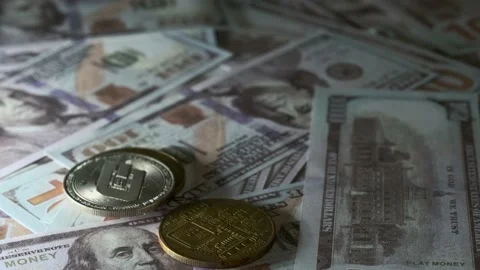 Wines on coins of cryptocoins on US dollars Stock Footage 201510117