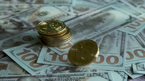 Wines on coins of cryptocoins on US dollars Stock Footage 201587897