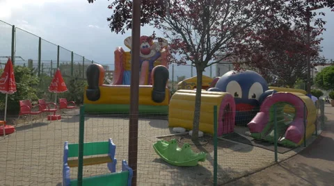 WInflatable slide in Iulius Park, Cluj-Napoca Stock Footage 55513722