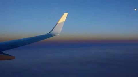 Wing of the aircraft during a flight in the evening. Video stock 160750556