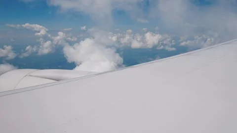 A wing with an airliner engine in flight Stock Footage 117666400