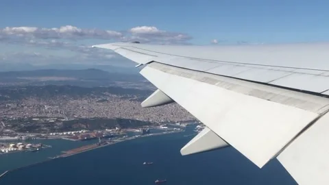Wing of the airplane against cloudy sky Video stock 141463672