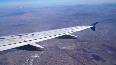 Wing Of An Airplane Flying Mountains Stock Footage 105038566