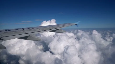Wing Of An Airplane Flying over Ground Stock Footage 105038517