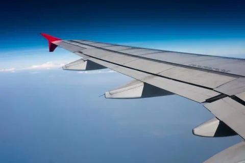 Wing of airplane Stock Photos
