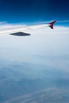 Wing of airplane Stock Photos