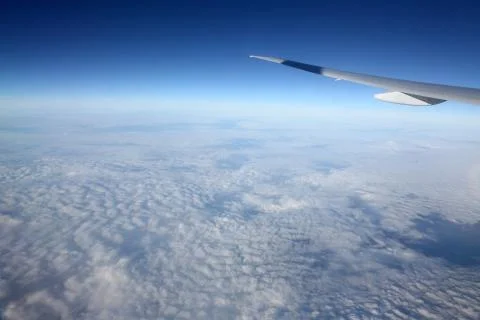 Wing of airplane Stock Photos