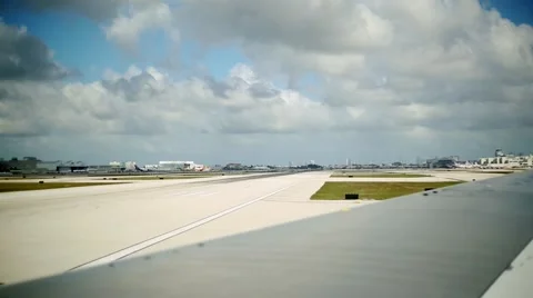 Wing of Airplane before plane taking off from runway Stock Footage 48906254