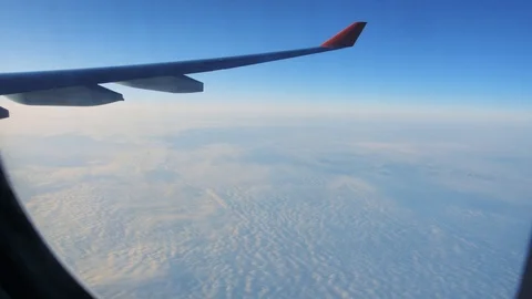 Wing of airplane from window. Видео 90411325