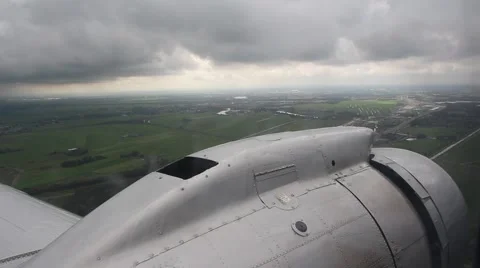 Wing and engine of a DC-3 Dakota during flight Stock Footage 42010093