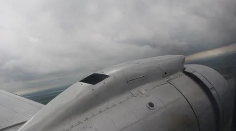 Wing and engine of a DC-3 Dakota during flight Stock Footage 42010099
