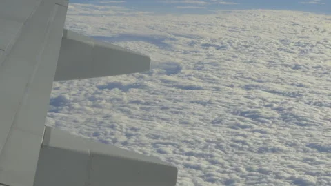 Wing with clouds below Stock Footage 346875563