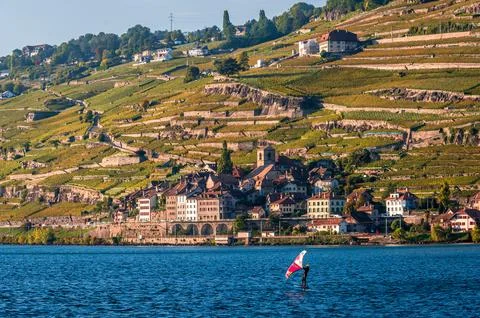 Wing Foiler on Lake Geneva in Front of UNESCO Lavaux Vineyards in Switzerland Stock Photos