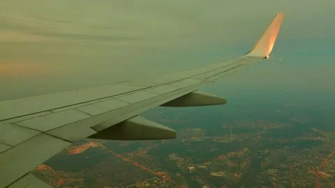 Wing of plane against background of sky horizon Stock Footage 89862397