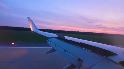 Wing of plane against background of sky horizon Stock Footage 90779988