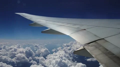 Wing of the plane and clouds, view from the plane. Version 2 Stock Footage 152663970