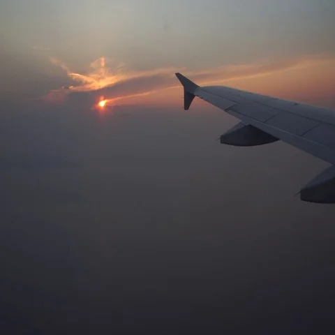 The wing of the plane on the background of sunset Video stock 69292352