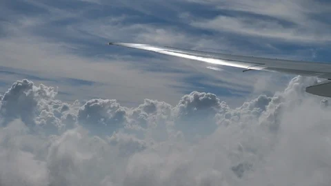 Wing of the plane in the clouds Stock Footage 92165946