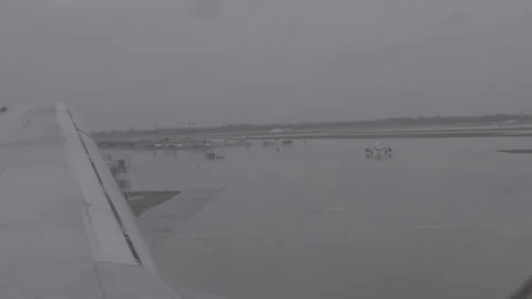 Wing of Plane Flying through the Clouds Stock Footage 154005732