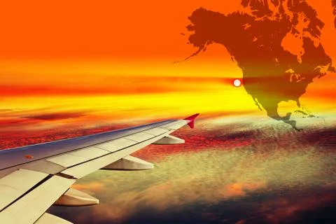 Wing of the plane at sunset Stock Photos