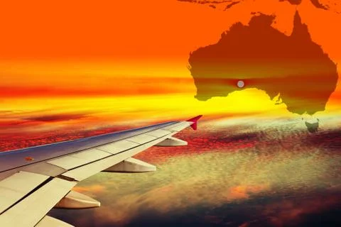 Wing of the plane at sunset Stock Photos