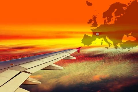 Wing of the plane at sunset Stock Photos