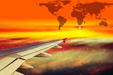 Wing of the plane at sunset Stock Photos