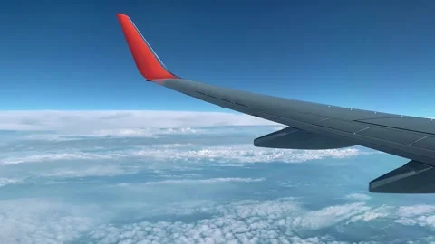 Wing of the plane swings from the wind in different directions Stock Footage 142104416