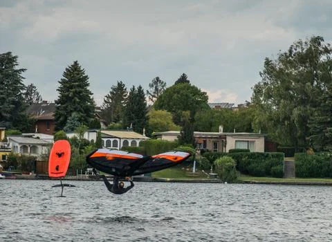 Wing surfer falling into the water after a jump Foto stock