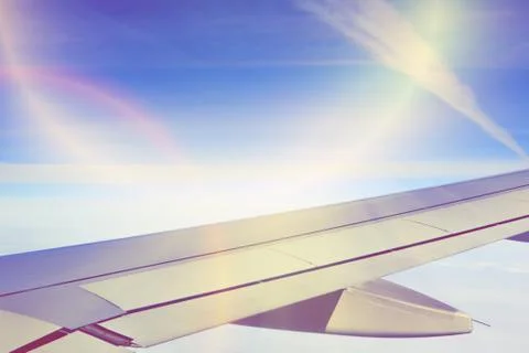 Wing view from airplane Stock Photos