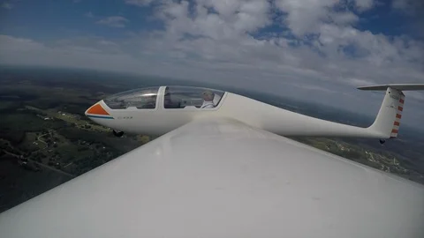 Wing view flying the glider plane and turning Video stock 108254773
