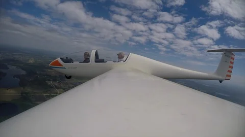 Wing view flying the glider plane Video stock 108579436