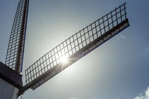 Wing of windmill in sun backlight Stock Photos