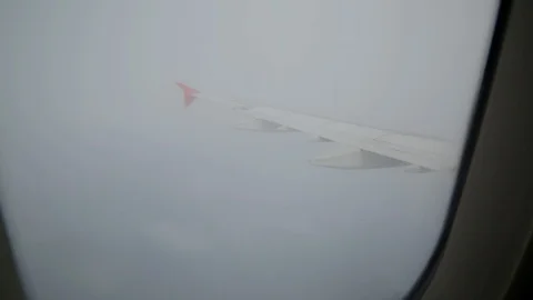 Wing From Window Of The Plane Footage3 Видео 98696679