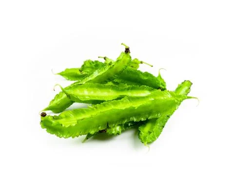 Winged beans on white background isolate. Vegetables to eat with chili paste. Stock Photos