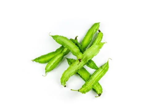 Winged beans on white background isolate. Vegetables to eat with chili paste. Stock Photos