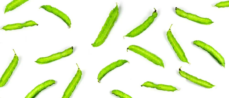 Winged beans on white background isolate. Vegetables to eat with chili paste. Stock Photos