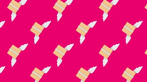 Winged cardboard boxes rotate in a repeating pattern on a vivid pink background Stock Footage 346045475