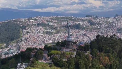 Winged Virgin Mary statue overlooking Quito, Ecuador, a panoramic view of urban 스톡 동영상 308411905