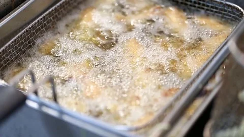 Wings are fried in deep fat Video stock 72857626