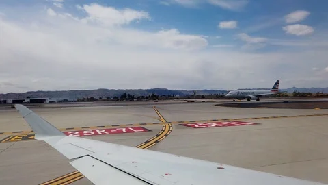 Wingside view of Plane taking off from Phoenix, Arizona Airport Stock Footage 107452313
