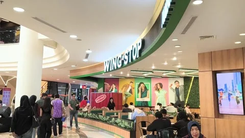 Wingstop restaurant inside a shopping mall. Stock Footage 320451118