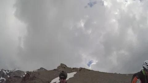 Wingsuit Jumper Jumps Down Cliff Wall 3 Video stock 79740931