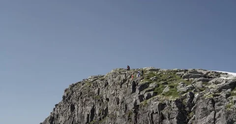 Wingsuit Jumper Jumps Down Cliff Wall 5 Stock Footage 79958752