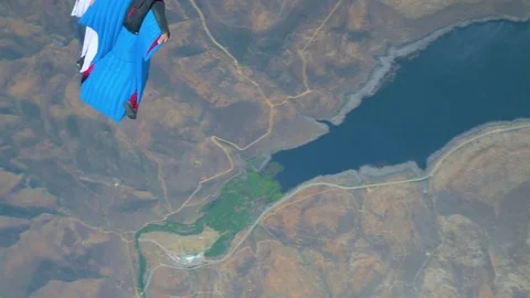 Wingsuit Jumpers Skydiving Through Sky 2 Stock Footage 78018384
