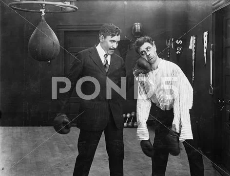 Winner and loser in boxing match Stock Photos