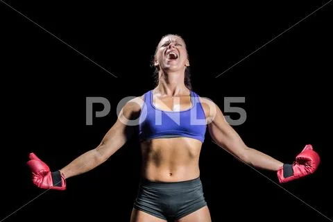 Winning fighter with arms outstretched Stock Photos